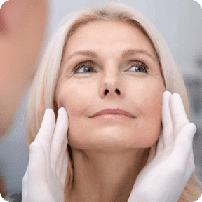 Woman enjoying face treatment