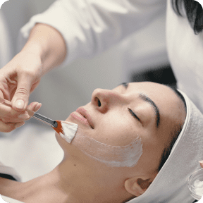 Woman getting skin care treatment